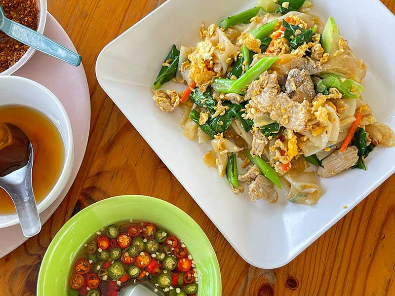 Pad See Ew, a popular Thai dish that consists of wide rice noodles